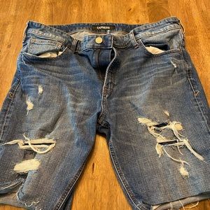 Vintage distressed express cut offs raw edge